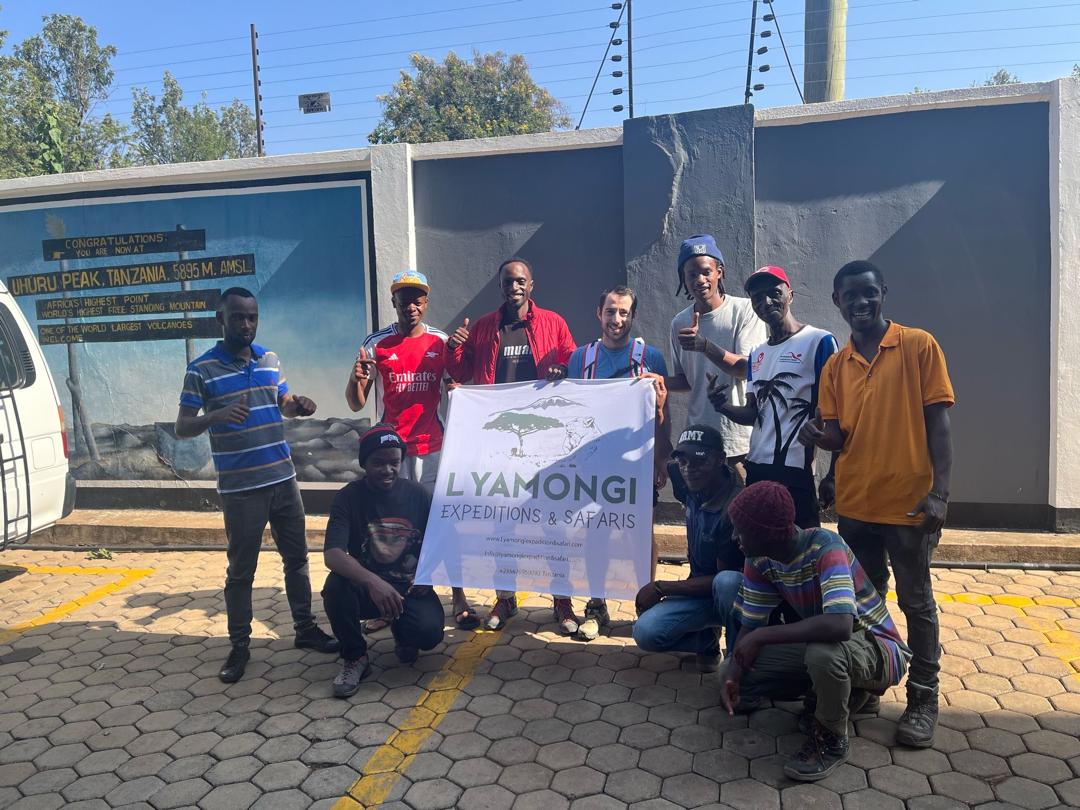 Full Lyamongi crew and climber celebrating after the trek